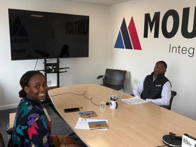 Two people recording the first Workwise podcast