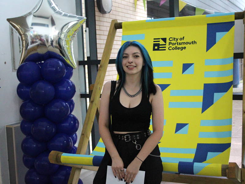 Student celebrating their results at Highbury Campus.