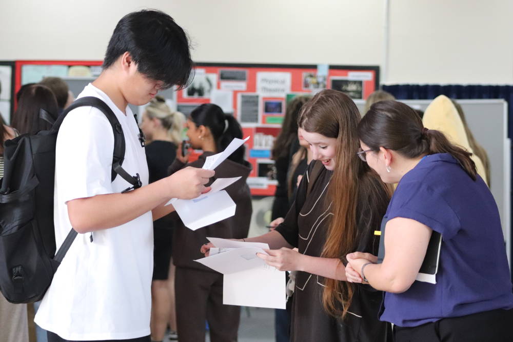 Students receiving their exam results 