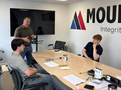 Two people recording the first Workwise podcast