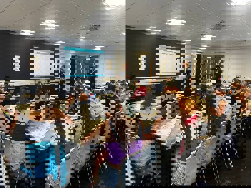 Students take notes during a presentation by Iglu Cruises