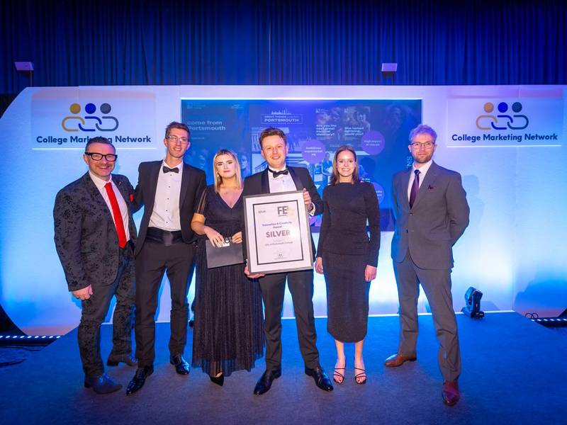 Members of the City of Portsmouth College marketing team collecting their award at the 2026 FE First Awards, Birmingham