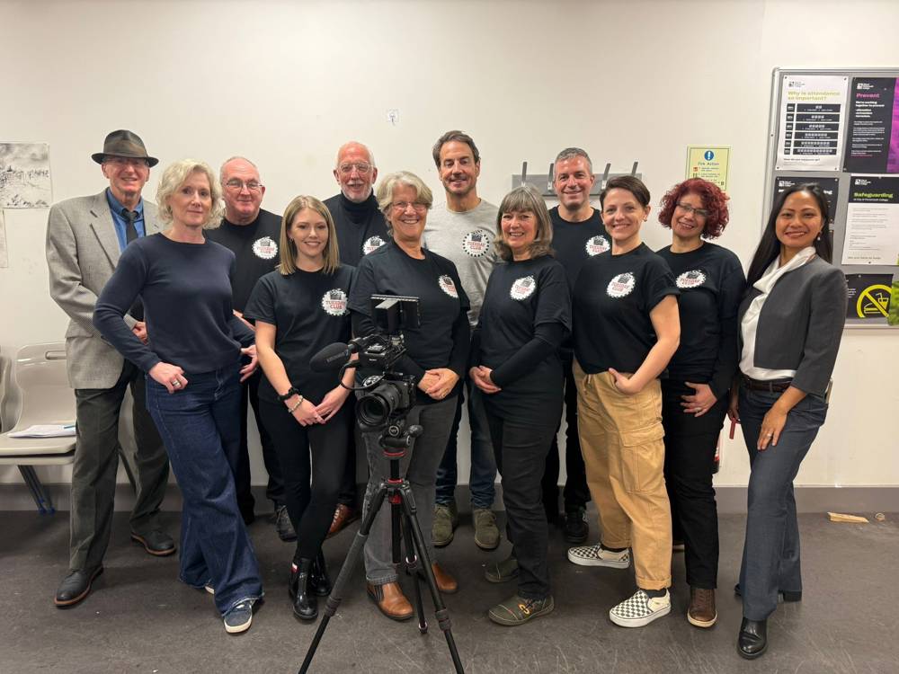 Members of the Tuesday Club Studios filmmaking team with their branded t-shirts on.