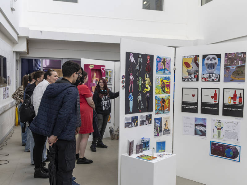 People take a look at the art on display at the 2026 Creative Festival